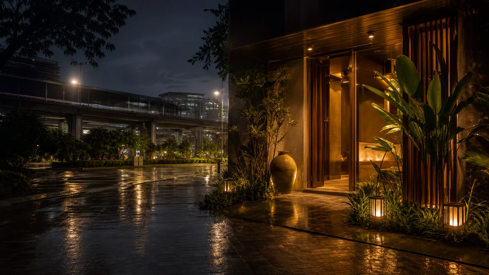 Rain-washed urban spa arrival scene near a transit corridor