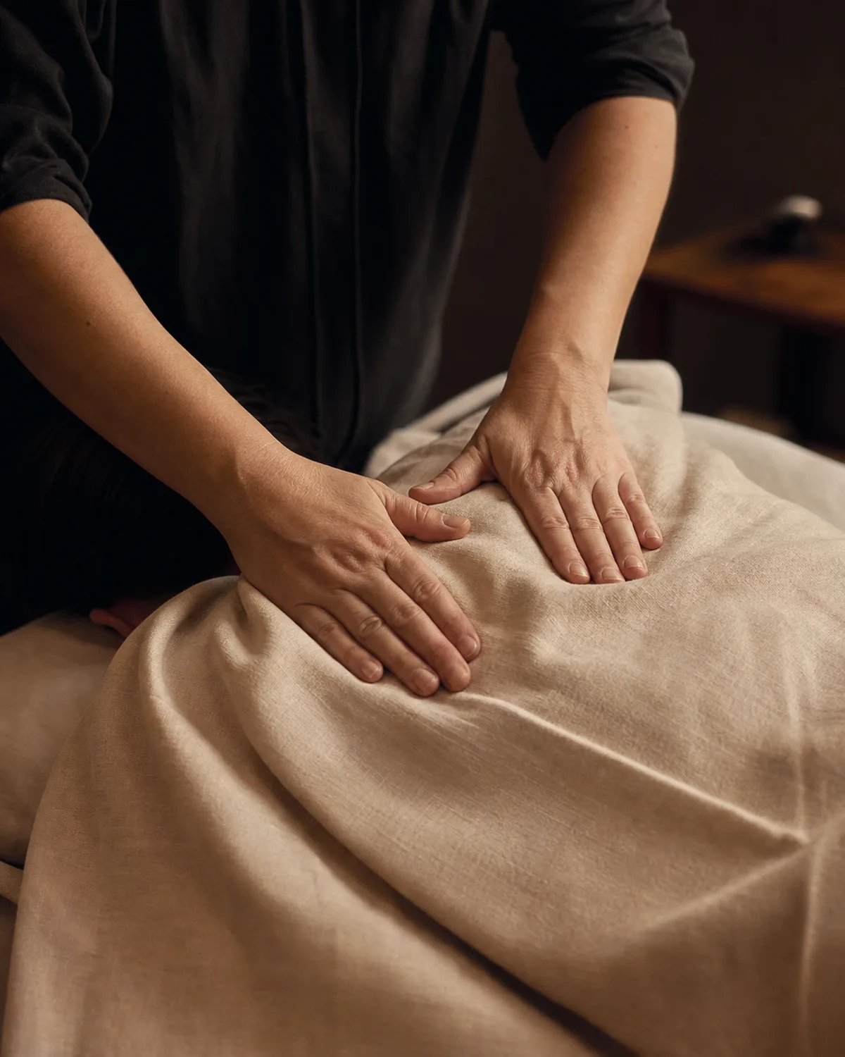 experience detail of a modestly draped massage treatment